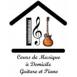 Photo de cours de musique guitare/piano à domicile